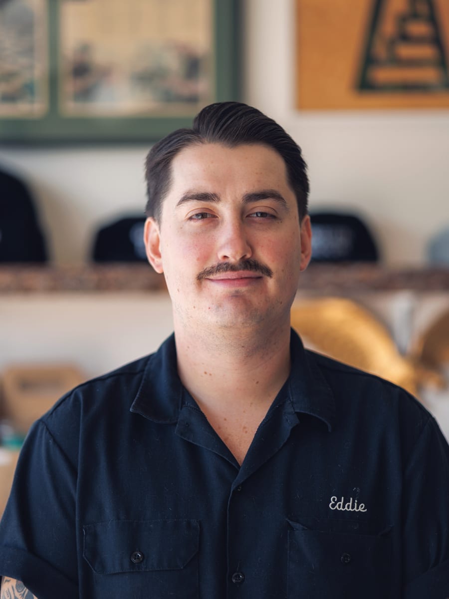 Eddie, a barber at The Green Room Barbershop